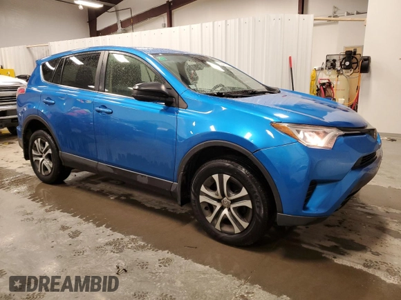 2018 Toyota RAV4 LE with VIN JTMBFREV9JJ197097, listed as a Copart auction lot 50042325 with 167,978 mi miles and Salvage Title. Bid and sale history available at DreamBid. Image 4.