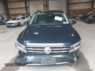 2018 Volkswagen Tiguan SEL with VIN 3VV2B7AX3JM133326, listed as a IAAI auction lot 42459190 with 94,665 mi miles and . Bid and sale history available at DreamBid. Image 12.