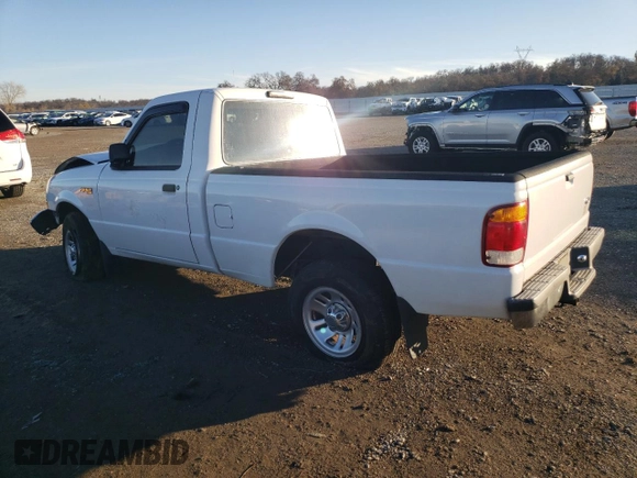 1999 Ford Ranger XLT with VIN 1FTYR10X8XUB20062, listed as a Copart auction lot 85779884 with 104,741 mi miles and Salvage title. Bid and sale history available at DreamBid. Image 2.