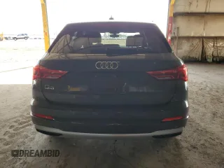 2020 Audi Q3 Premium with VIN WA1AECF34L1034797, listed as a Copart auction lot 51096385 with 74,192 mi miles and Salvage title. Bid and sale history available at DreamBid. Image 6.