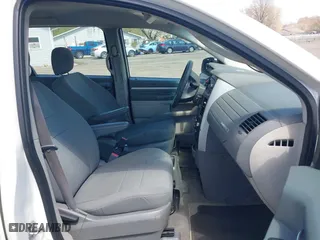 2010 Dodge Grand Caravan SE with VIN 2D4RN4DE0AR107498, listed as a IAAI auction lot 42048596 with 242,643 mi miles. Bid and sale history available at carsss.com. Image 5.