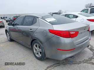 2015 Kia Optima LX with VIN 5XXGM4A72FG464193, listed as a IAAI auction lot 39285719 with 198,383 mi miles and . Bid and sale history available at carsss.com. Image 3.