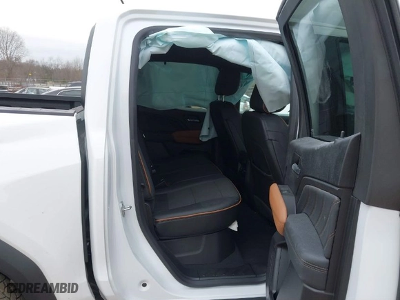 2024 GMC Canyon 4WD AT4 with VIN 1GTP6DEK1R1230068, listed as a IAAI auction lot 41491052 with 2,058 mi miles. Bid and sale history available at carsss.com. Image 8.
