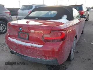 2016 BMW 2 Series 228i xDrive with VIN WBA1L9C56GV324278, listed as a IAAI auction lot 41414710 with 101,785 mi miles. Bid and sale history available at carsss.com. Image 4.
