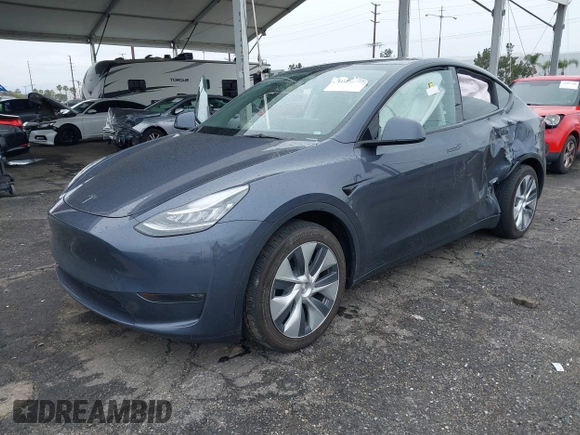 2023 Tesla Model Y Long Range with VIN 7SAYGDEE3PA152683, listed as a IAAI auction lot 41798988 with 14,063 mi miles and . Bid and sale history available at carsss.com. Image 17.