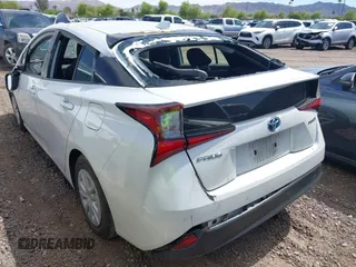 2022 Toyota Prius L Eco with VIN JTDKAMFUXN3181752, listed as a IAAI auction lot 42015717 with 129,637 mi miles and . Bid and sale history available at DreamBid. Image 3.
