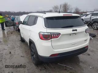 2019 Jeep Compass Latitude with VIN 3C4NJCBB4KT778018, listed as a IAAI auction lot 41900231 with 102,651 mi miles and . Bid and sale history available at carsss.com. Image 3.