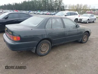 1994 Toyota Camry LE z VIN JT2GK12E1R0036423, wystawiony jako IAAI lot #41922375 z przebiegiem 211 529 mil mil oraz . Historia ofert i sprzedaży dostępna na DreamBid. Obrazek 4.