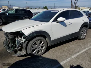 2021 Mazda CX-30 Select with VIN 3MVDMABL2MM210703, listed as a Copart auction lot 50205625 with 42,308 mi miles and Salvage Title. Bid and sale history available at carsss.com. Image 1.