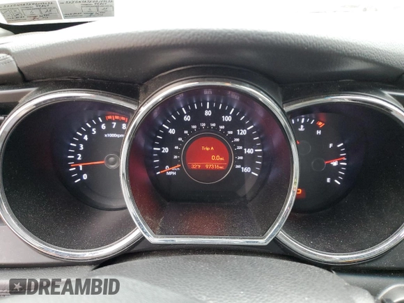 2013 Kia Optima EX z VIN 5XXGN4A7XDG144632, wystawiony jako Copart lot #83599614 z przebiegiem 97 316 mil mil oraz Szkoda całkowita • Salvage title. Historia ofert i sprzedaży dostępna na DreamBid. Obrazek 9.