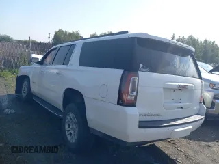 2019 GMC Yukon XL SLT with VIN 1GKS2GKC1KR279755, listed as a Copart auction lot 64695394 with 0 mi miles and Salvage Title. Bid and sale history available at carsss.com. Image 2.