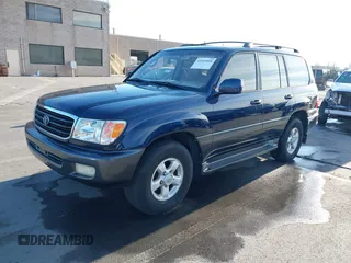 2000 Toyota Land Cruiser with VIN JT3HT05J3Y0098534, listed as a IAAI auction lot 41054858 with 336,520 mi miles. Bid and sale history available at carsss.com. Image 2.