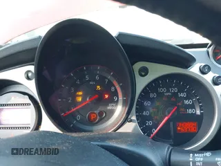 2014 Nissan 370Z Nismo with VIN JN1AZ4EH9EM636340, listed as a IAAI auction lot 42112548 with 143,894 mi miles and . Bid and sale history available at DreamBid. Image 7.