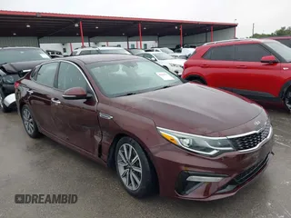 2019 Kia Optima LX with VIN 5XXGT4L30KG355125, listed as a IAAI auction lot 42366011 with 111,334 mi miles and . Bid and sale history available at DreamBid. Image 1.