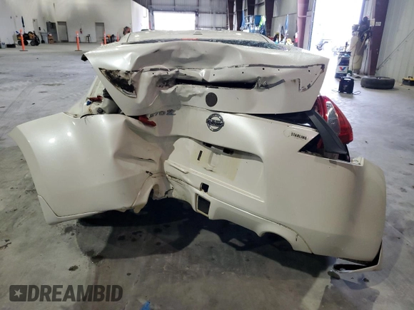 2012 Nissan 370Z z VIN JN1AZ4EH3CM565276, wystawiony jako Copart lot #56654845 z przebiegiem 77 788 mil mil oraz Nie do naprawy. Historia ofert i sprzedaży dostępna na DreamBid. Obrazek 6.