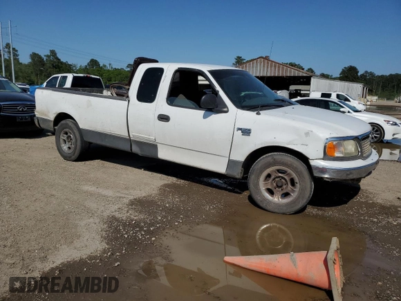 2001 Ford F-150 XL with VIN 1FTRX17L71KF21294, listed as a Copart auction lot 52054605 with Not provided miles and Salvage title. Bid and sale history available at DreamBid. Image 4.