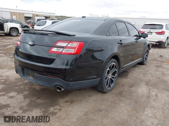 2013 Ford Taurus SHO with VIN 1FAHP2KT1DG113007, listed as a IAAI auction lot 41914541 with 50,630 mi miles and . Bid and sale history available at DreamBid. Image 4.