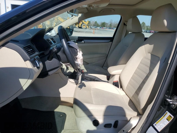 2015 Volkswagen Passat SE with VIN 1VWBS7A35FC076077, listed as a Copart auction lot 46589295 with 76,419 mi miles and Salvage title. Bid and sale history available at DreamBid. Image 7.