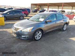 2015 Nissan Altima 2.5 SV with VIN 1N4AL3AP4FC438025, listed as a IAAI auction lot 41657713 with 192,870 mi miles. Bid and sale history available at carsss.com. Image 2.