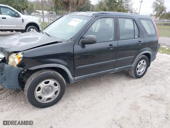 2005 Honda CR-V LX with VIN JHLRD68565C016677, listed as a IAAI auction lot 41570773 with 192,932 mi miles. Bid and sale history available at carsss.com. Image 2.