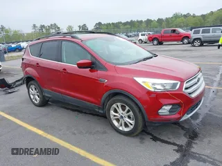 2018 Ford Escape SE with VIN 1FMCU0GD3JUB96144, listed as a IAAI auction lot 41849308 with 83,532 mi miles. Bid and sale history available at carsss.com. Image 1.