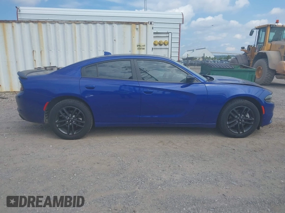 2019 Dodge Charger SXT with VIN 2C3CDXJG4KH550424, listed as a IAAI auction lot 40224159 with 56,988 mi miles and . Bid and sale history available at DreamBid. Image 13.