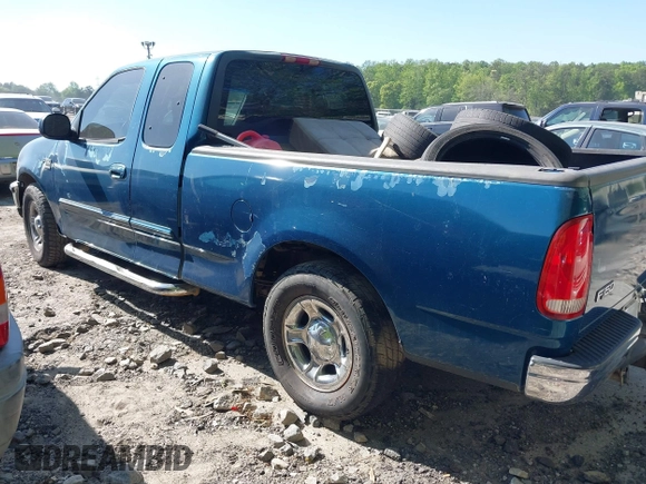 2000 Ford F-150 XL with VIN 1FTRX17L5YNC02971, listed as a IAAI auction lot 42041309 with Not provided miles and . Bid and sale history available at DreamBid. Image 3.