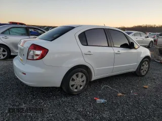 2010 Suzuki SX4 LE with VIN JS2YC5A24A6301771, listed as a Copart auction lot 83049774 with 165,033 mi miles and Salvage Title. Bid and sale history available at carsss.com. Image 3.