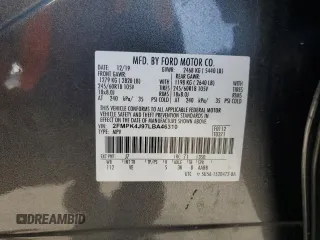 2020 Ford Edge SEL z VIN 2FMPK4J97LBA46310, wystawiony jako Copart lot #56177805 z przebiegiem 97 180 mil mil oraz Szkoda całkowita • Salvage title. Historia ofert i sprzedaży dostępna na DreamBid. Obrazek 13.