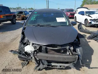 2015 Toyota Yaris L with VIN VNKKTUD31FA027763, listed as a IAAI auction lot 41886803 with 104,889 mi miles. Bid and sale history available at carsss.com. Image 6.