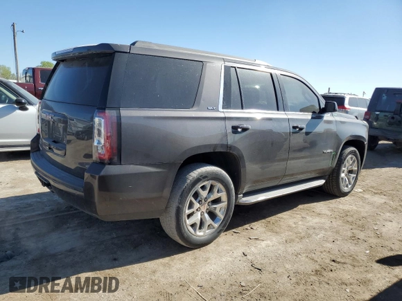2015 GMC Yukon SLT z VIN 1GKS2BKC9FR147397, wystawiony jako Copart lot #53157845 z przebiegiem 131 552 mil mil oraz Szkoda całkowita • Salvage title. Historia ofert i sprzedaży dostępna na DreamBid. Obrazek 3.