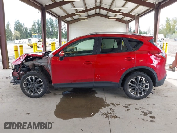 2016 Mazda CX-5 Grand Touring with VIN JM3KE4DY3G0688062, listed as a IAAI auction lot 42025169 with 59,867 mi miles and . Bid and sale history available at carsss.com. Image 15.