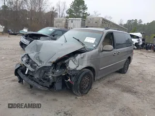2005 Kia Sedona LX with VIN KNDUP132056674430, listed as a IAAI auction lot 41553321 with 136,734 mi miles. Bid and sale history available at carsss.com. Image 17.
