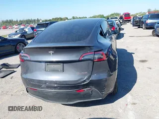 2022 Tesla Model Y Performance with VIN 7SAYGDEF6NF540094, listed as a IAAI auction lot 41786865 with 28,356 mi miles and . Bid and sale history available at DreamBid. Image 16.