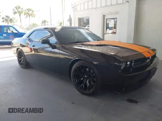 2010 Dodge Challenger R/T z VIN 2B3CJ5DT9AH239525, wystawiony jako IAAI lot #42169327 z przebiegiem 53 986 mil mil oraz . Historia ofert i sprzedaży dostępna na DreamBid. Obrazek 1.