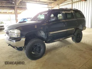 2003 GMC Yukon SLT z VIN 1GKEK13T33J280804, wystawiony jako Copart lot #52050415 z przebiegiem 162 529 mil mil oraz Czysty tytuł • Clean title. Historia ofert i sprzedaży dostępna na DreamBid. Obrazek 1.