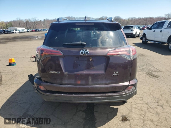 2018 Toyota RAV4 LE with VIN 2T3BFREV9JW721351, listed as a Copart auction lot 51282075 with 118,240 mi miles and Salvage Title. Bid and sale history available at DreamBid. Image 6.