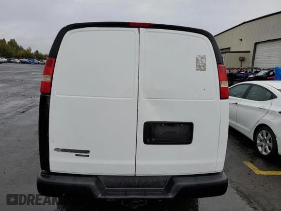 2014 Chevrolet Express Cargo Van with VIN 1GCWGGBA1E1193958, listed as a Copart auction lot 77208494 with 126,193 mi miles and Clean Title. Bid and sale history available at carsss.com. Image 6.