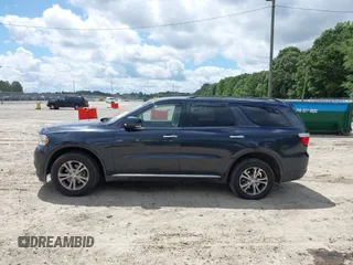 2013 Dodge Durango Crew with VIN 1C4RDHDG7DC657898, listed as a IAAI auction lot 42522353 with 234,483 mi miles and . Bid and sale history available at DreamBid. Image 14.