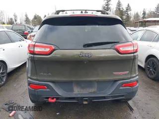 2015 Jeep Cherokee Trailhawk with VIN 1C4PJMBB5FW510514, listed as a IAAI auction lot 41492111 with 98,482 mi miles and . Bid and sale history available at DreamBid. Image 17.