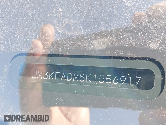 2019 Mazda CX-5 Grand Touring with VIN JM3KFADM5K1556917, listed as a IAAI auction lot 41706323 with 77,804 mi miles. Bid and sale history available at carsss.com. Image 9.