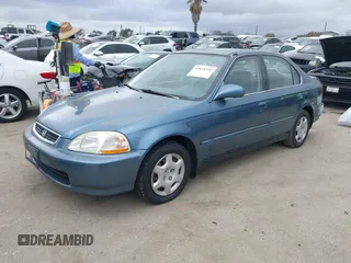 1998 Honda Civic EX with VIN JHMEJ8644WS002096, listed as a IAAI auction lot 41828342 with 184,283 mi miles. Bid and sale history available at carsss.com. Image 2.