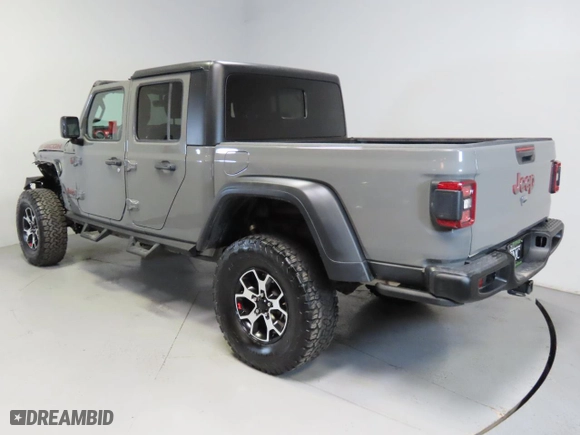 2023 Jeep Gladiator Rubicon with VIN 1C6JJTBG4PL562478, listed as a Copart auction lot 48821495 with 14,053 mi miles and Salvage Title. Bid and sale history available at carsss.com. Image 4.