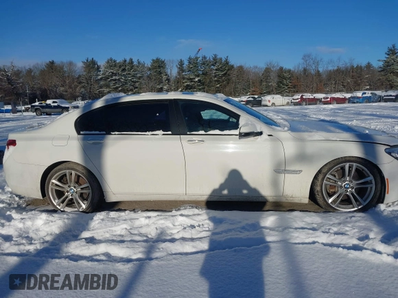 2014 BMW 7 Series 740Li xDrive with VIN WBAYF4C57ED282182, listed as a IAAI auction lot 41324877 with 102,699 mi miles. Bid and sale history available at carsss.com. Image 13.
