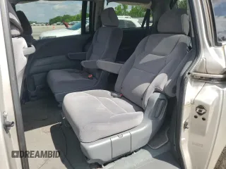 2007 Honda Odyssey LX z VIN 5FNRL382X7B084104, wystawiony jako Copart lot #57399625 z przebiegiem 213 134 mil mil oraz Szkoda całkowita • Salvage title. Historia ofert i sprzedaży dostępna na DreamBid. Obrazek 11.