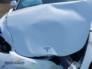 2021 Tesla Model 3 Standard Range Plus z VIN 5YJ3E1EA5MF941392, wystawiony jako IAAI lot #41888597 z przebiegiem 111 617 mil mil oraz . Historia ofert i sprzedaży dostępna na DreamBid. Obrazek 10.