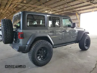 2022 Jeep Wrangler Unlimited High Tide with VIN 1C4HJXDG2NW221829, listed as a Copart auction lot 64836074 with 3,394 mi miles and Salvage Title. Bid and sale history available at DreamBid. Image 3.