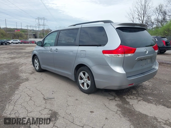 2012 Toyota Sienna LE AAS with VIN 5TDKK3DC9CS227584, listed as a IAAI auction lot 41972758 with 258,077 mi miles. Bid and sale history available at carsss.com. Image 3.