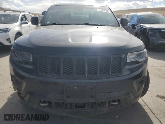 2014 Jeep Grand Cherokee Overland with VIN 1C4RJFCT2EC106002, listed as a Copart auction lot 48763675 with 143,011 mi miles and Salvage Title. Bid and sale history available at DreamBid. Image 5.