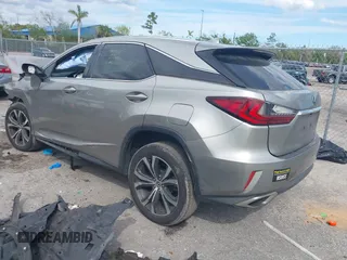 2019 Lexus RX with VIN 2T2ZZMCA1KC131631, listed as a IAAI auction lot 41692742 with 90,161 mi miles. Bid and sale history available at carsss.com. Image 3.